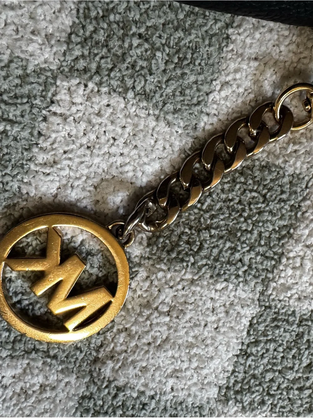 Michael Kors Black Pebbled Leather Shoulder Bag with Gold-Tone MK Charm